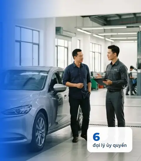 Hình ảnh mô phỏng khách hàng trao đổi với kỹ thuật viên tại xưởng dịch vụ ô tô